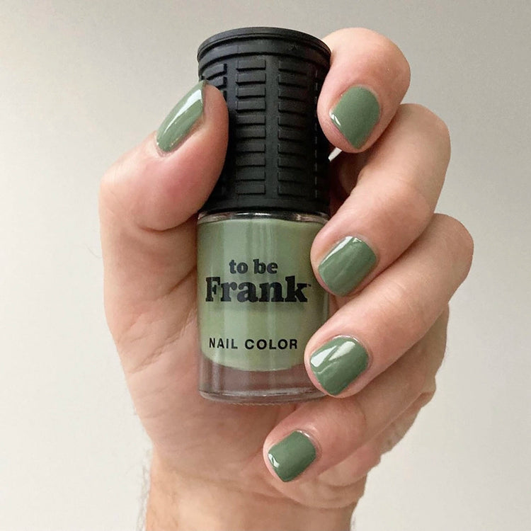 To Be Frank army green nail polish named Boot Camp with hand and short nails painted