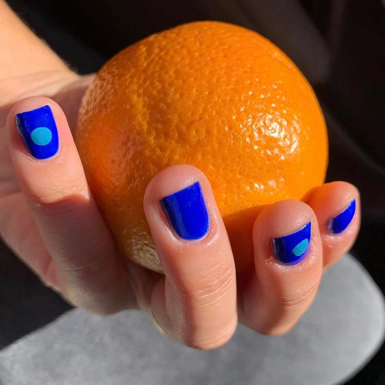 To Be Frank cobalt blue nail polish named Evil Eye manicure featured in Refinery29