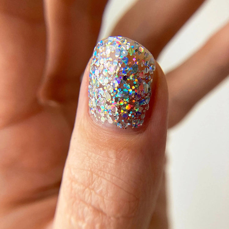 To Be Frank glitter top coat nail polish named Glitter Me This close up