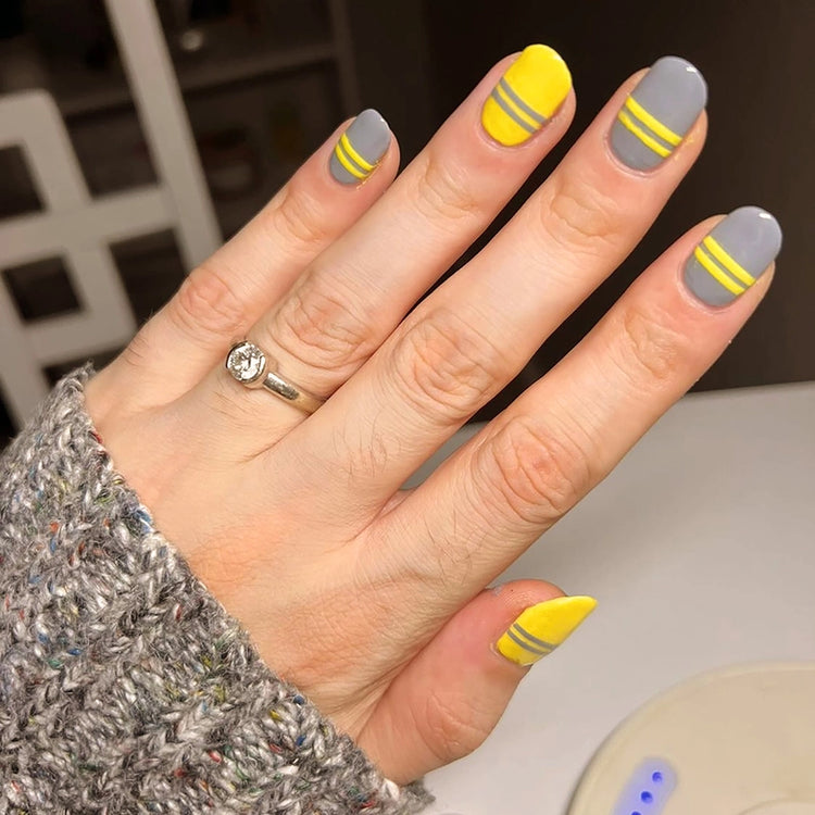 To Be Frank yellow nail polish named Sunny AF combined with Mood gray polish